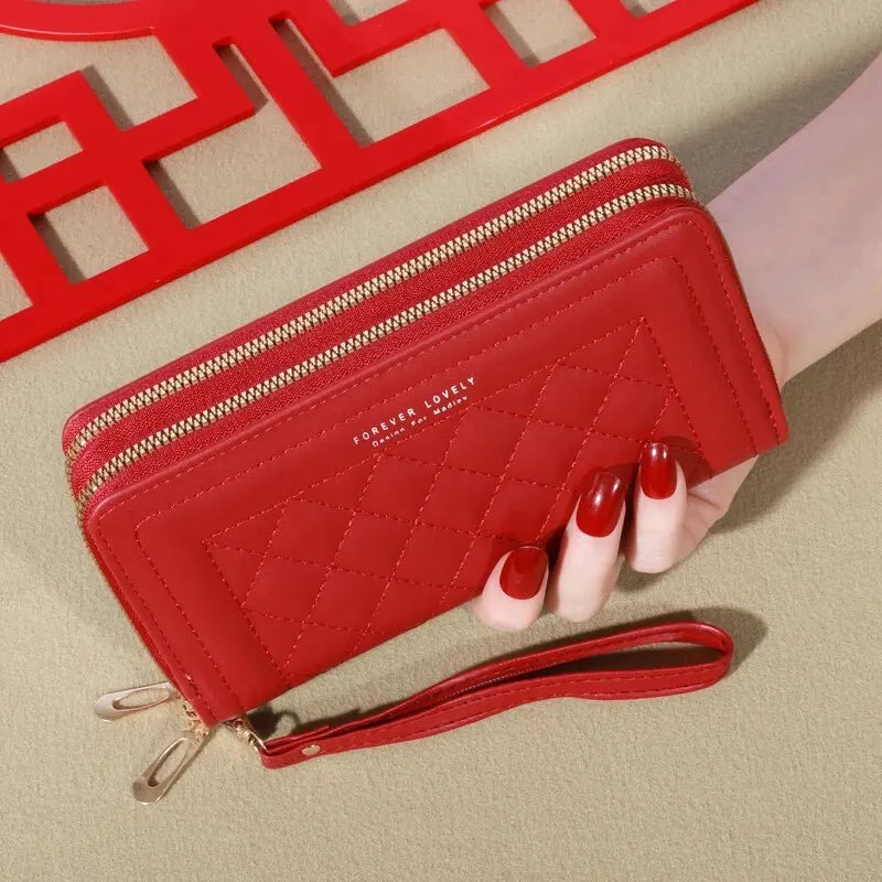 LuxeTassel Clutch