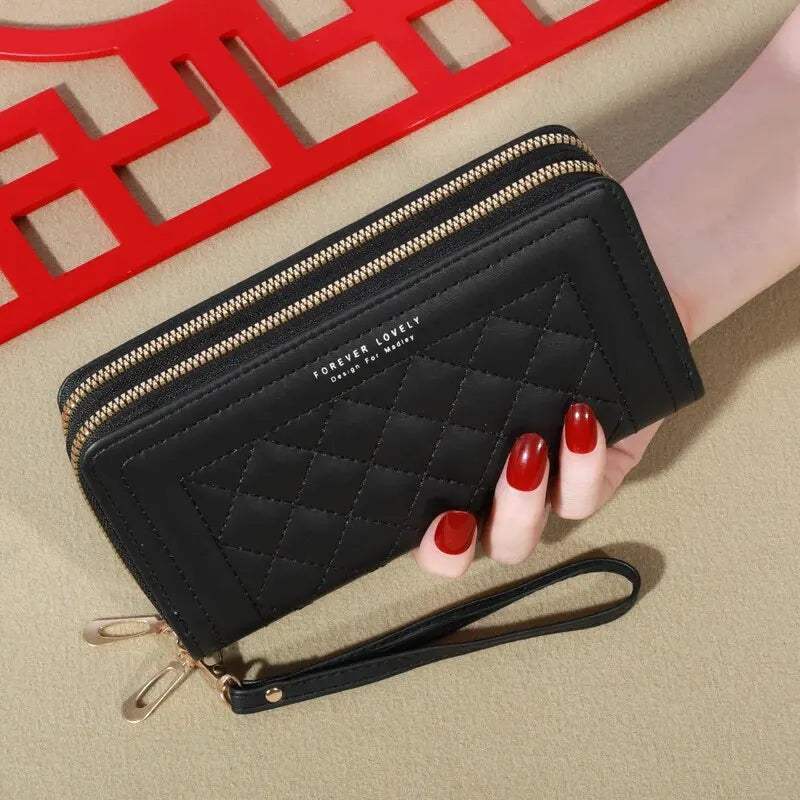 LuxeTassel Clutch
