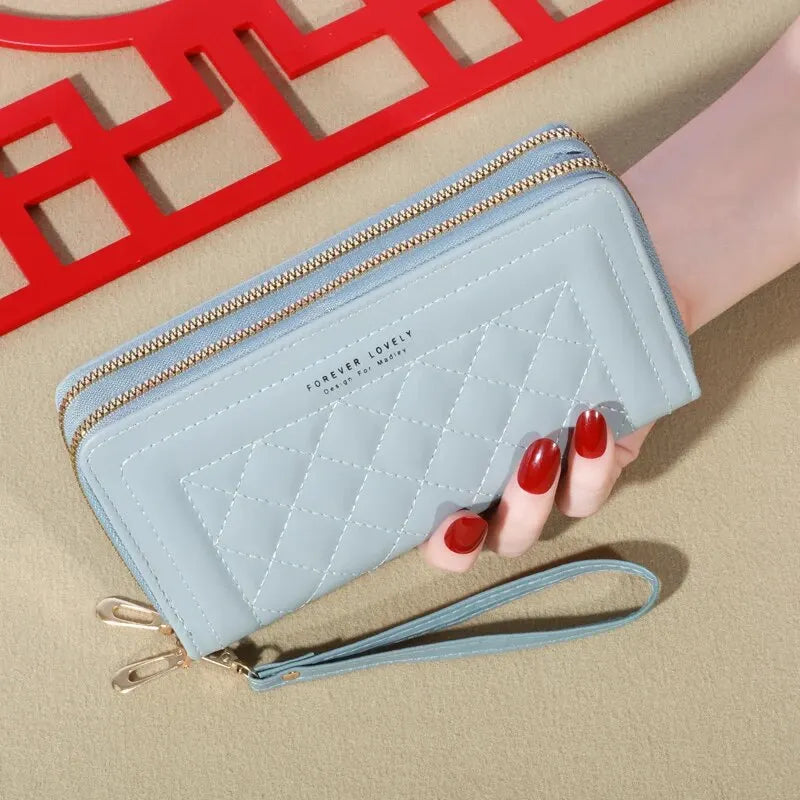 LuxeTassel Clutch