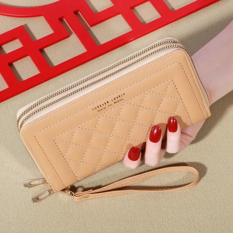 LuxeTassel Clutch